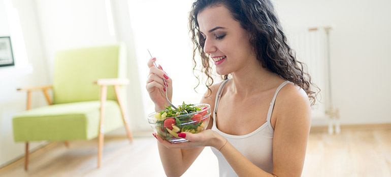 Girl eating Lowest Calorie Foods